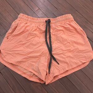 Selling glyder shorts, size small, color peach